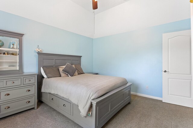 bedroom with baseboards, light colored carpet, and a ceiling fan