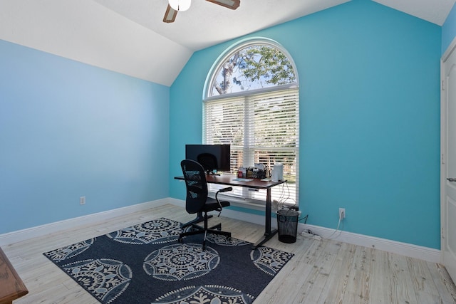 office space with wood finished floors, baseboards, a ceiling fan, and vaulted ceiling