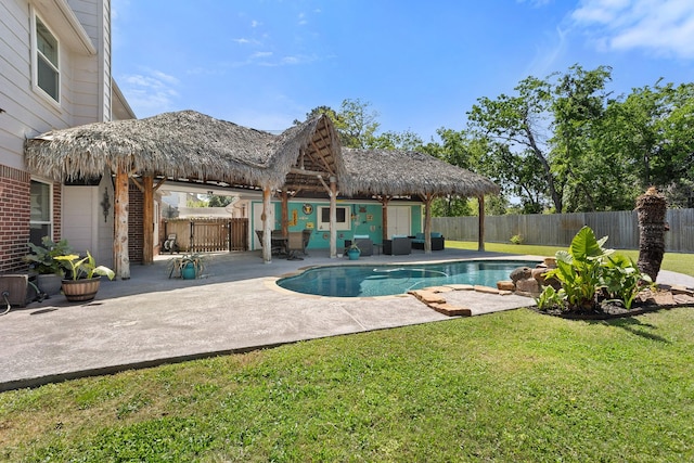 view of pool featuring a fenced in pool, a patio area, a gazebo, a fenced backyard, and a yard