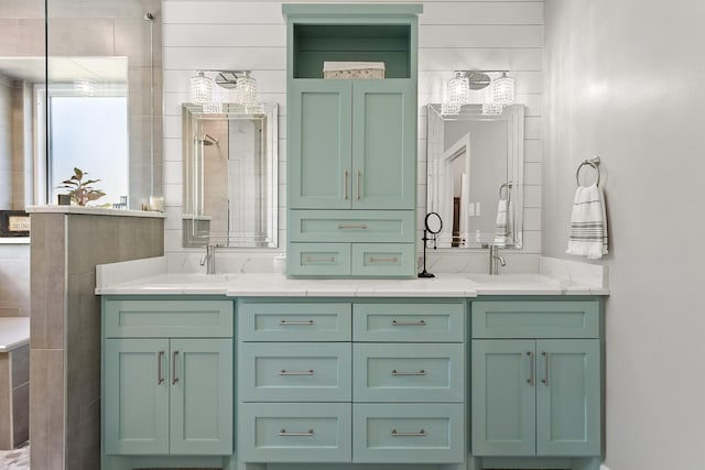 bathroom featuring a sink and double vanity