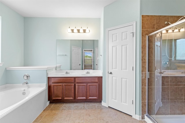 2451 Porto Way, League City, TX 77573 - full bath with a bath, a sink, double vanity, tile patterned flooring, and a stall shower