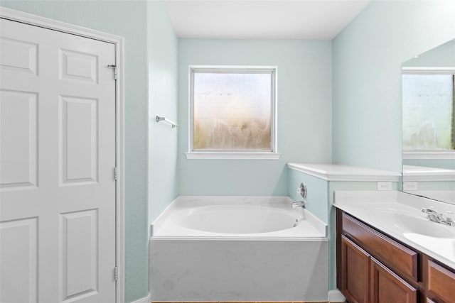 2451 Porto Way, League City, TX 77573 - bathroom featuring vanity and a garden tub
