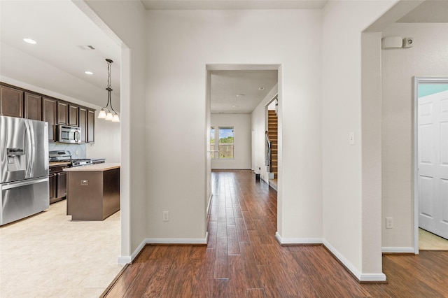 2451 Porto Way, League City, TX 77573 - corridor with baseboards, recessed lighting, and wood finished floors
