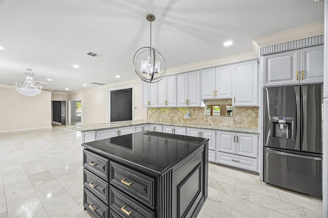509 Joan Of Arc Dr, Hempstead, TX 77445 - kitchen featuring stainless steel fridge with ice dispenser, a chandelier, decorative backsplash, hanging light fixtures, and crown molding