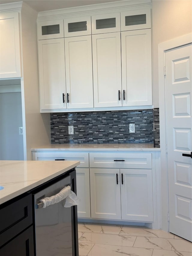 5398 Kyla Cir, Katy, TX 77493 - bar with stainless steel dishwasher, marble finish floor, and backsplash