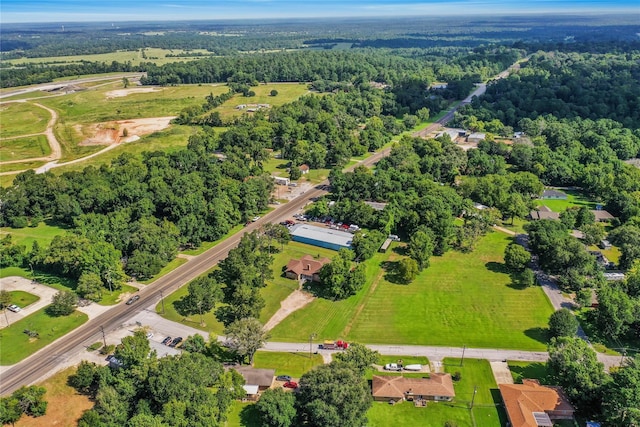 2201 Badger Ln, Huntsville, TX 77320 - birds eye view of property featuring a wooded view