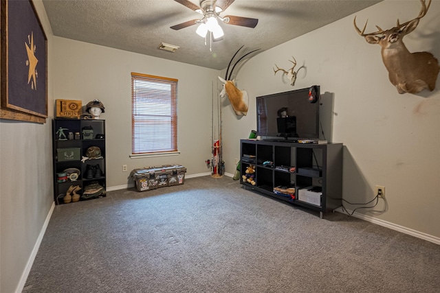 14718 Cypress Green Dr, Cypress, TX 77429 - playroom featuring a textured ceiling, visible vents, ceiling fan, and carpet floors