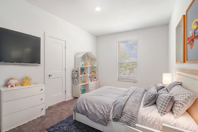 carpeted bedroom with recessed lighting