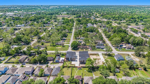 aerial view of property's location featuring nearby suburban area