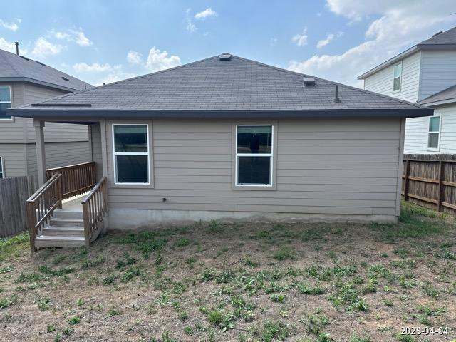 6710 Greensleeves, San Antonio, TX 78252 - back of house with fence and a shingled roof
