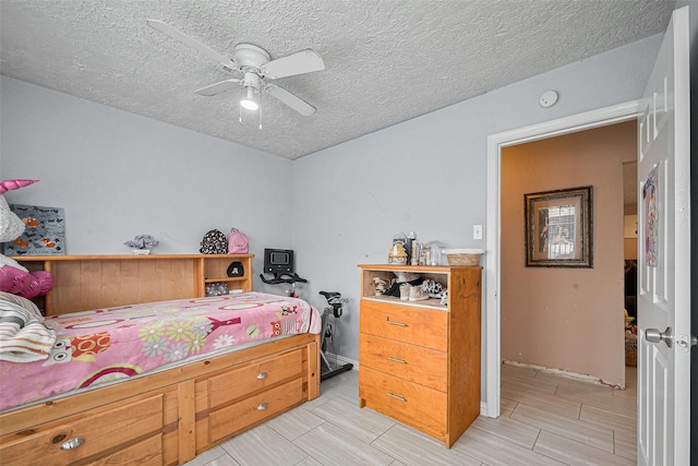 9034 Talton St, Houston, TX 77078 - bedroom with a ceiling fan and a textured ceiling