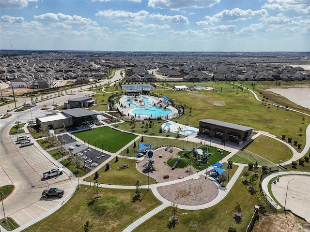 birds eye view of property with a residential view