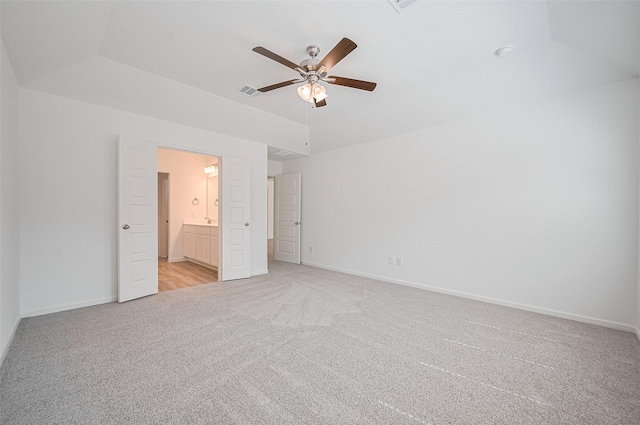 22607 Rising Rosehill Ln, Tomball, TX 77377 - unfurnished bedroom with light carpet, ensuite bathroom, baseboards, and ceiling fan