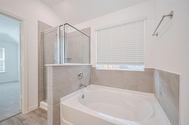 22607 Rising Rosehill Ln, Tomball, TX 77377 - bathroom featuring plenty of natural light, a shower stall, and a bath