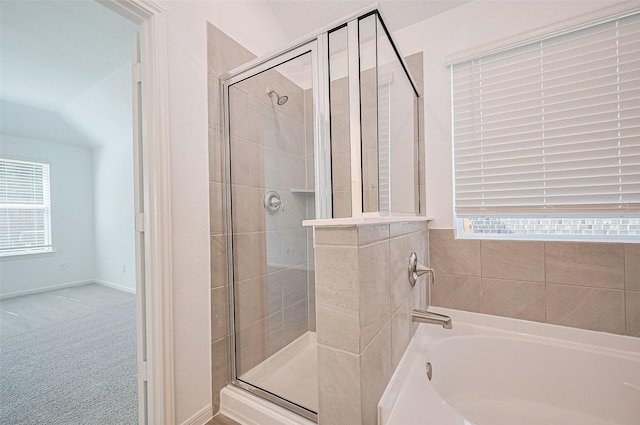 22607 Rising Rosehill Ln, Tomball, TX 77377 - full bathroom featuring a shower stall, a bath, and plenty of natural light