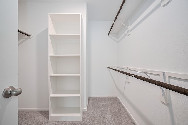 22607 Rising Rosehill Ln, Tomball, TX 77377 - spacious closet featuring carpet flooring