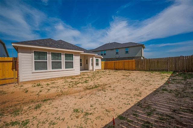 22607 Rising Rosehill Ln, Tomball, TX 77377 - back of house with a fenced backyard