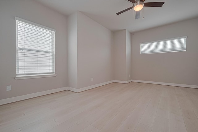 8915 Grovner Pl, Houston, TX 77055 - empty room featuring ceiling fan, light wood-type flooring, and baseboards