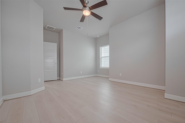 8915 Grovner Pl, Houston, TX 77055 - empty room featuring a ceiling fan, baseboards, and light wood-type flooring