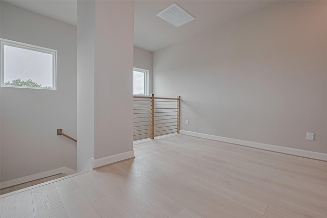 8915 Grovner Pl, Houston, TX 77055 - unfurnished room featuring wood finished floors and baseboards