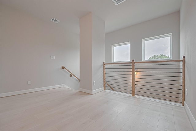8915 Grovner Pl, Houston, TX 77055 - unfurnished room featuring light wood-type flooring and baseboards