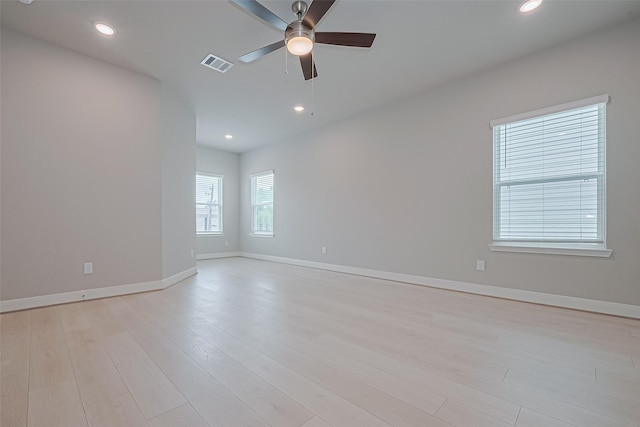 8915 Grovner Pl, Houston, TX 77055 - spare room with ceiling fan, light wood-type flooring, recessed lighting, and baseboards