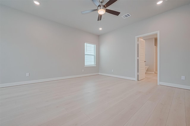 8915 Grovner Pl, Houston, TX 77055 - empty room with a ceiling fan, recessed lighting, light wood-style floors, and baseboards