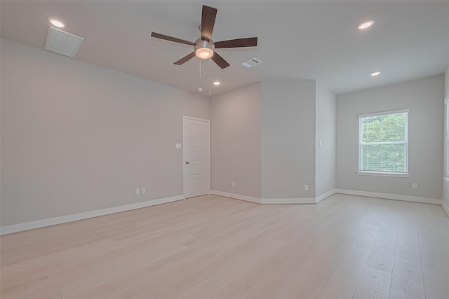 8915 Grovner Pl, Houston, TX 77055 - unfurnished room featuring ceiling fan, light wood finished floors, recessed lighting, and baseboards