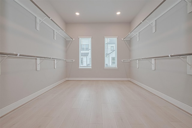8915 Grovner Pl, Houston, TX 77055 - spacious closet featuring light wood-type flooring