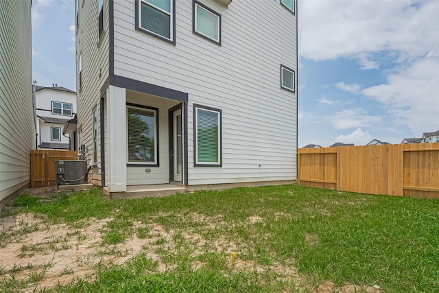8915 Grovner Pl, Houston, TX 77055 - rear view of property with cooling unit
