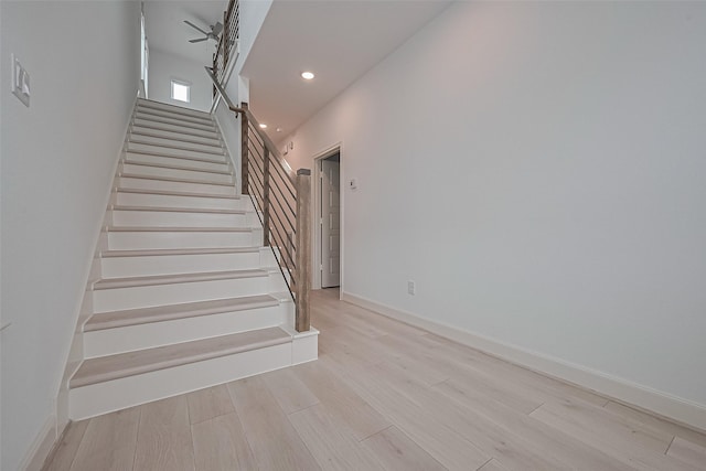 1609 Regents Gate, Houston, TX 77055 - stairway with wood finished floors, recessed lighting, and baseboards