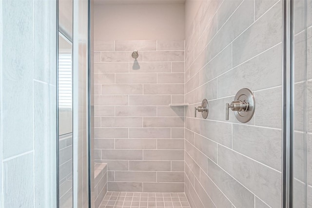 bathroom with a shower stall