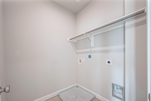laundry room featuring laundry area, hookup for an electric dryer, washer hookup, and baseboards