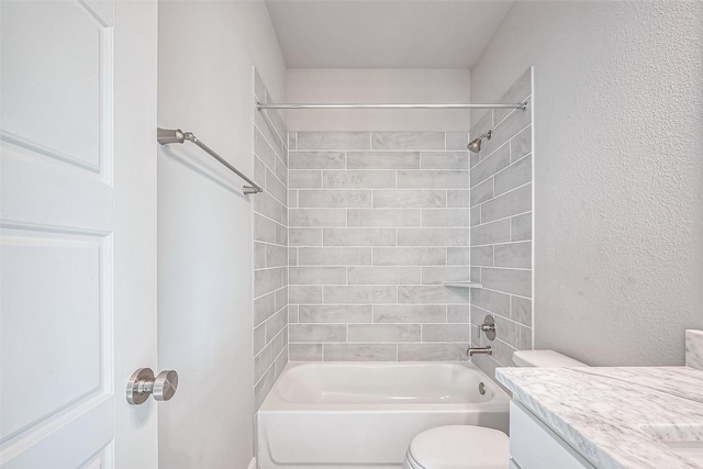 full bath featuring toilet, vanity, and shower / washtub combination