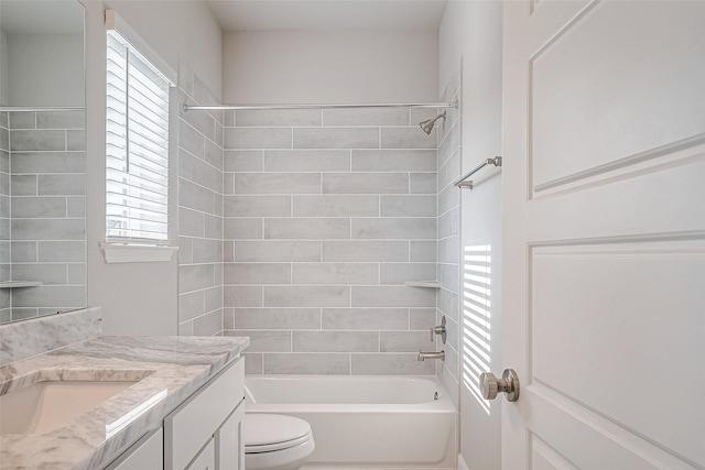 full bathroom featuring toilet, shower / bathing tub combination, and vanity