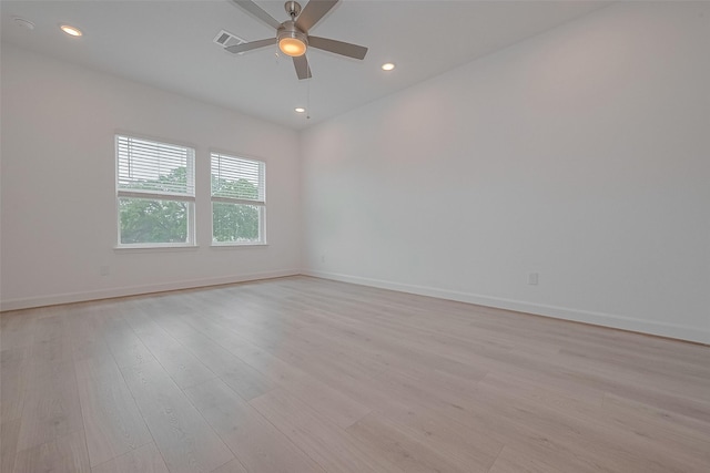 1611 Regents Gate Ct, Houston, TX 77055 - unfurnished room with light wood finished floors, recessed lighting, a ceiling fan, and baseboards