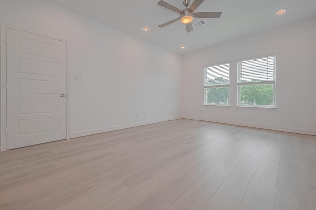 1611 Regents Gate Ct, Houston, TX 77055 - spare room featuring ceiling fan, light wood finished floors, baseboards, and recessed lighting