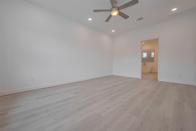 1611 Regents Gate Ct, Houston, TX 77055 - unfurnished room featuring a ceiling fan, light wood-style floors, baseboards, and recessed lighting