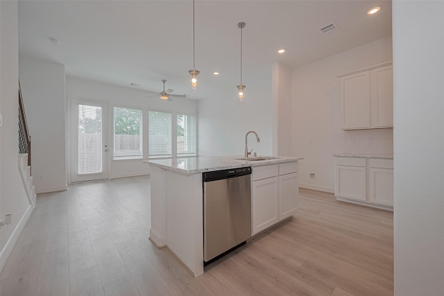 1611 Regents Gate Ct, Houston, TX 77055 - kitchen with stainless steel dishwasher, a sink, light wood-type flooring, a ceiling fan, and recessed lighting