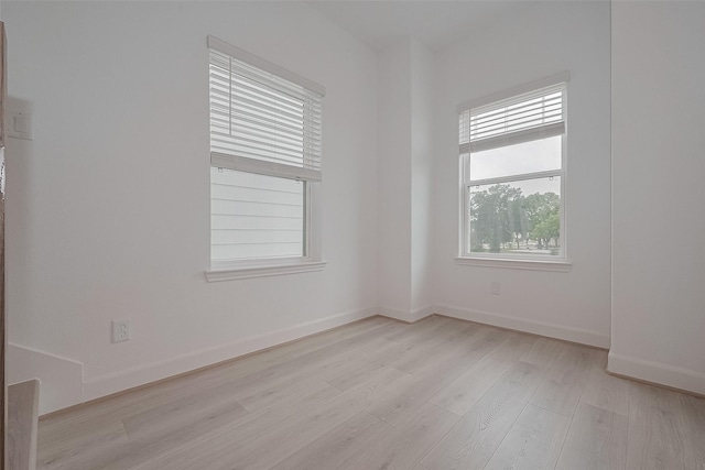 1611 Regents Gate Ct, Houston, TX 77055 - spare room with light wood-style flooring and baseboards