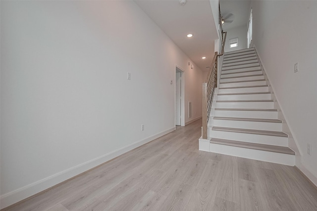 1611 Regents Gate Ct, Houston, TX 77055 - stairs with wood finished floors, recessed lighting, baseboards, and a ceiling fan