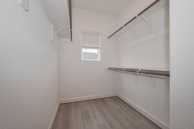 1611 Regents Gate Ct, Houston, TX 77055 - spacious closet with wood finished floors