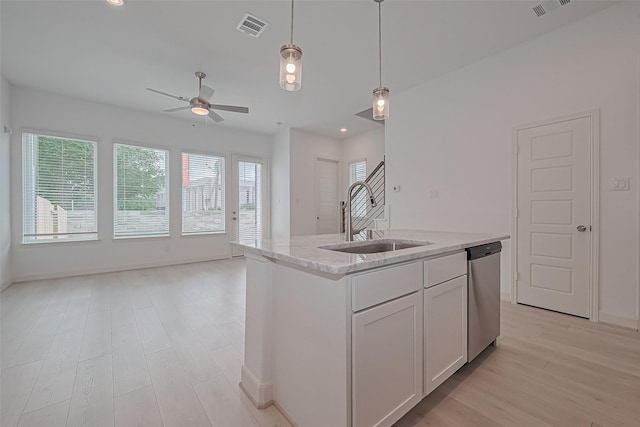 8928 Covenant Pl, Houston, TX 77055 - kitchen featuring dishwasher, a sink, a ceiling fan, open floor plan, and light wood-style flooring