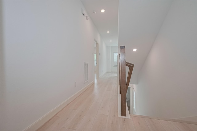 8928 Covenant Pl, Houston, TX 77055 - hallway featuring recessed lighting, light wood finished floors, baseboards, and an upstairs landing