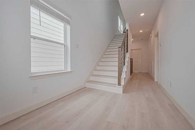8928 Covenant Pl, Houston, TX 77055 - staircase with wood finished floors, recessed lighting, and baseboards