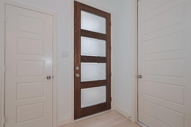 8928 Covenant Pl, Houston, TX 77055 - entryway with baseboards and light wood-type flooring