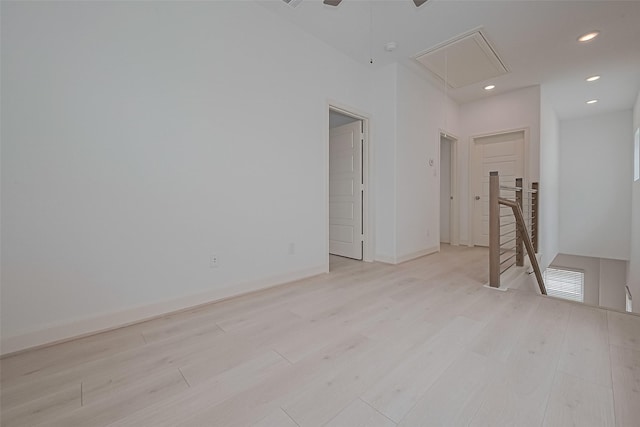 8928 Covenant Pl, Houston, TX 77055 - spare room with attic access, light wood-style flooring, recessed lighting, and baseboards
