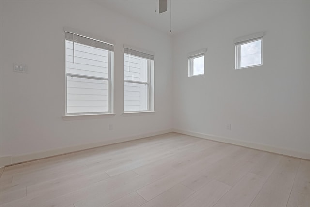 8928 Covenant Pl, Houston, TX 77055 - empty room featuring a ceiling fan, light wood-style flooring, and baseboards