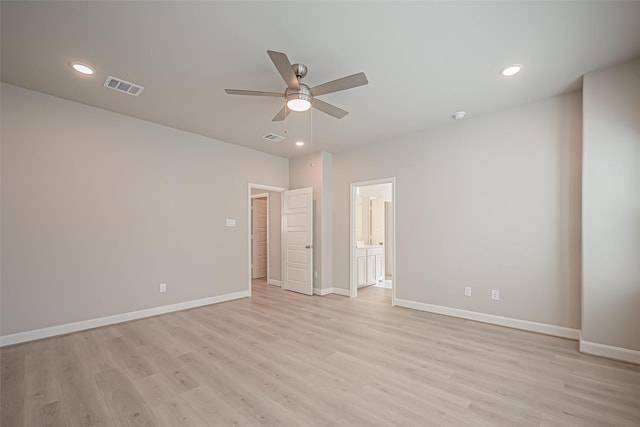 unfurnished bedroom featuring light wood-style floors, recessed lighting, visible vents, and baseboards