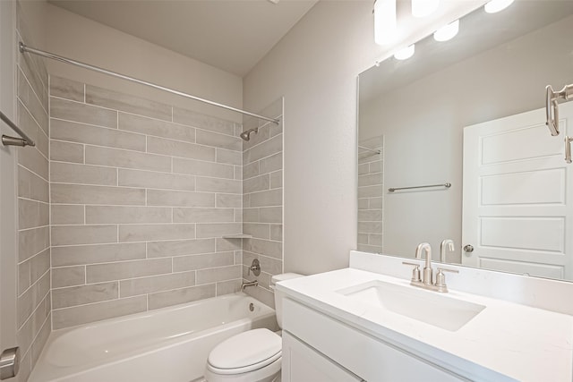 bathroom featuring vanity, toilet, and shower / washtub combination